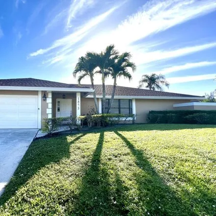 Rent this 4 bed house on 1873 Hollyhock Road in Wellington, FL 33414