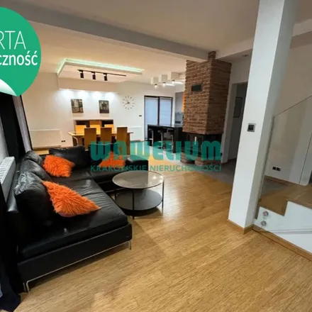 Rent this 5 bed apartment on Henryka Niewodniczańskiego 19 in 30-698 Krakow, Poland