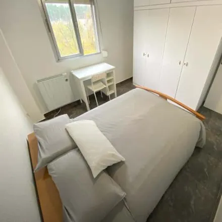 Rent this 4 bed room on Calle del Estroncio in 28021 Madrid, Spain