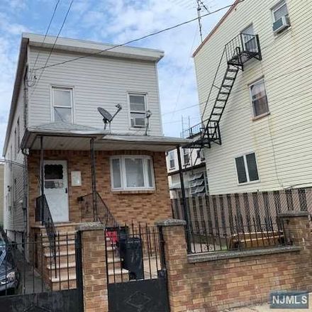 Rent this 4 bed townhouse on 171 Lafayette Street in Newark, NJ 07105