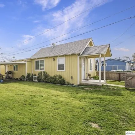 Buy this 2 bed house on 1199 2nd Street in Corning, CA 96021