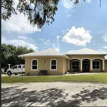 Buy this 4 bed house on 6594 Buckboard Street in North Port, FL 34291