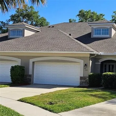 Buy this 3 bed house on 1999 Turnbull Lakes Drive in New Smyrna Beach, FL 32168