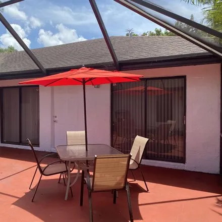 Rent this 2 bed condo on 1291 Periwinkle Place in Wellington, FL 33414