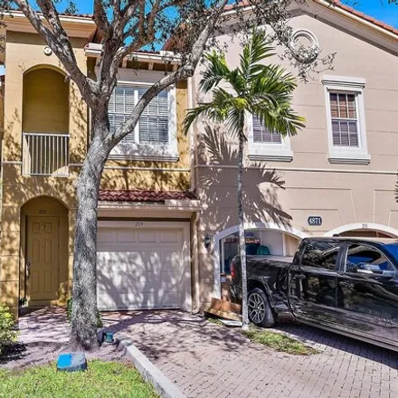 Buy this 2 bed townhouse on Bonsai Circle in Palm Beach Gardens, FL