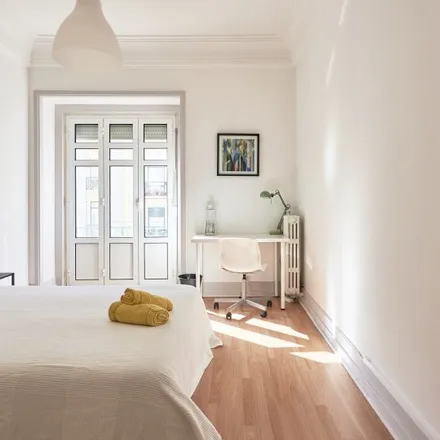 Rent this 13 bed room on Comedouro in Rua Joaquim António de Aguiar, 1269-133 Lisbon