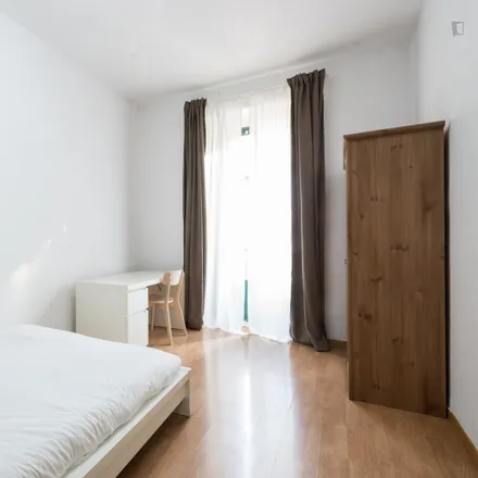 Rent this 8 bed room on Calle de Fuencarral in 41, 28004 Madrid