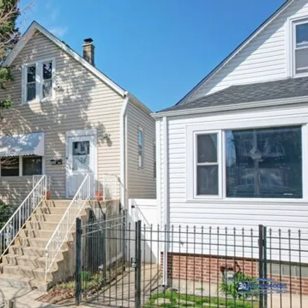 Buy this 2 bed house on 2414 North Lotus Avenue in Chicago, IL 60639