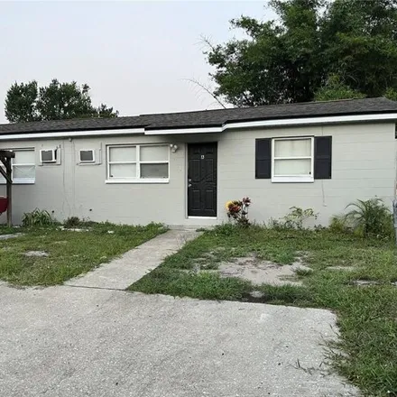 Buy this 4 bed house on 9669 North 13th Street in Tampa, FL 33612