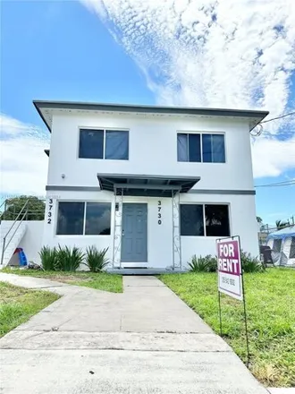 Rent this 2 bed house on 3741 Avenue S in Riviera Beach, FL 33404