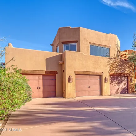 Rent this 4 bed house on 40071 North 107th Place in Scottsdale, AZ 85262