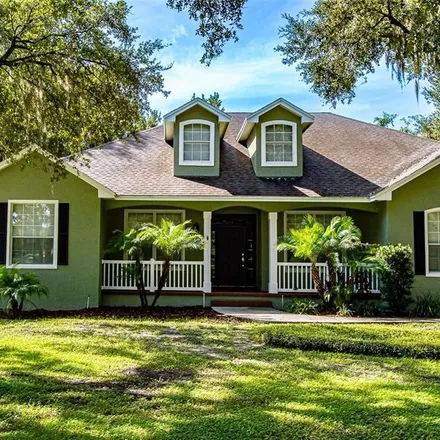 Buy this 4 bed house on 5598 Deer Tracks Court in Polk County, FL 33811