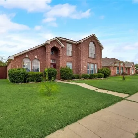 Buy this 4 bed house on 1403 Marblecrest Drive in Lewisville, TX 75067