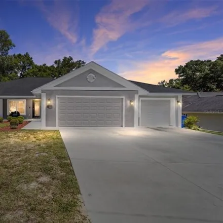 Buy this 3 bed house on 8514 Southeast 162nd Place in Marion County, FL 34491