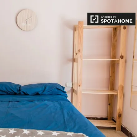 Rent this 3 bed room on Plaça del Mercat in 46001 Valencia, Spain