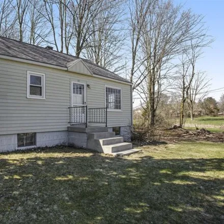 Buy this 2 bed house on 658 10 Mile Road Northeast in Plainfield Charter Township, MI 49321