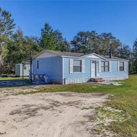 Buy this studio apartment on 11087 Northeast 60th Lane in Levy County, FL 32621