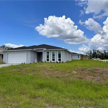 Buy this 4 bed house on 4146 Northeast 21st Avenue in Cape Coral, FL 33909