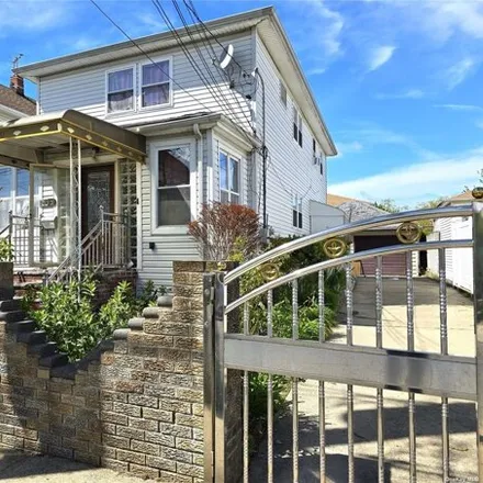 Buy this 6 bed house on 259-51 148th Drive in New York, NY 11422