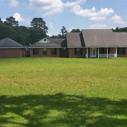 Buy this 3 bed house on 14038 Morgan Drive in Montgomery County, TX 77372