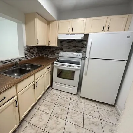 Rent this 2 bed apartment on 3500 Northwest 21st Street in East Gate Park, Lauderdale Lakes