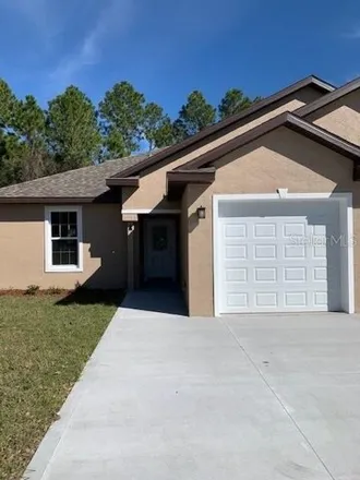 Rent this 3 bed house on 64 Llosee Court in Palm Coast, FL 32164