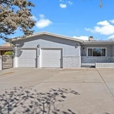 Buy this 3 bed house on 1326 Chama Street Northeast in Albuquerque, NM 87110