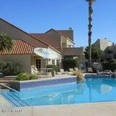 Rent this 2 bed condo on Building A in 1200 East River Road, Tucson