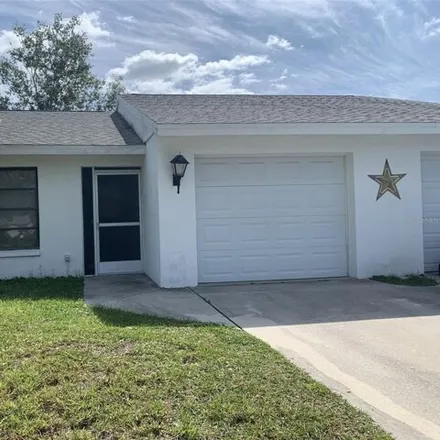 Rent this 2 bed house on 629 Michigan Avenue in Englewood, FL 34223