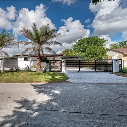 Buy this 6 bed house on 10402 Northwest 35th Court in Miami-Dade County, FL 33147