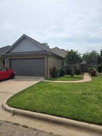 Rent this 3 bed house on 654 Harbour Town Drive in Lake Dallas, Denton County