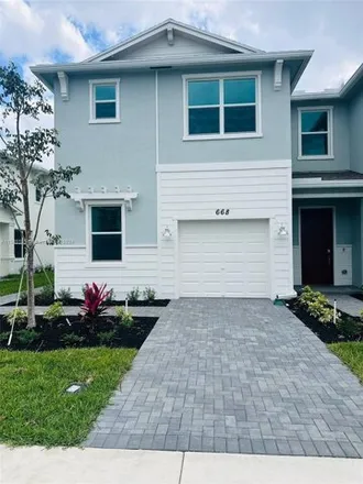 Rent this 3 bed house on unnamed road in Port Saint Lucie, FL 34593