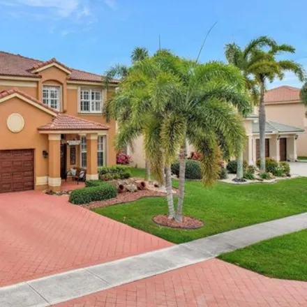 Buy this 4 bed house on 3558 Moon Bay Circle in Wellington, FL 33414