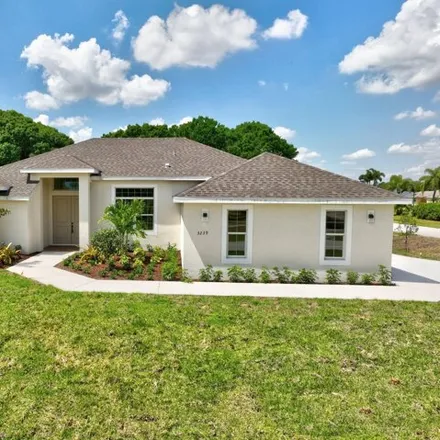 Buy this 3 bed house on 327 Southeast Navy Avenue in Port Saint Lucie, FL 34984