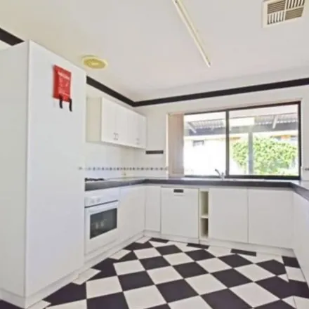 Rent this 4 bed apartment on Holcombe Road in Warnbro WA 6172, Australia
