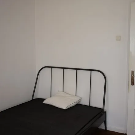 Rent this 7 bed room on Rua José Estevão 46 in 1150-192 Lisbon, Portugal