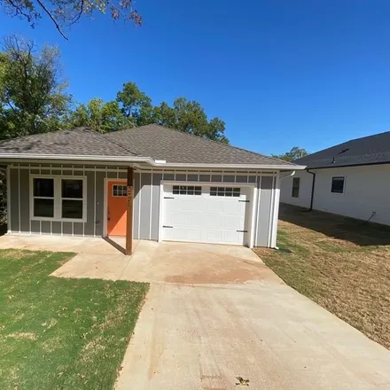 Rent this 3 bed house on 1221 West Johnson Street in Denison, TX 75020