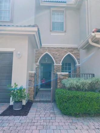 Rent this 3 bed townhouse on 22550 SW 89th Pl