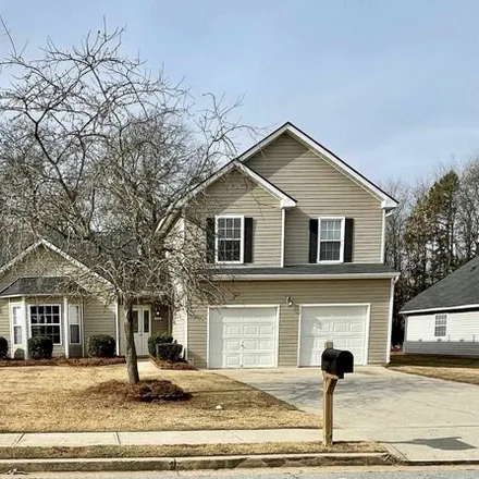 Buy this 3 bed house on 1676 Village Place Circle Northeast in Conyers, GA 30012