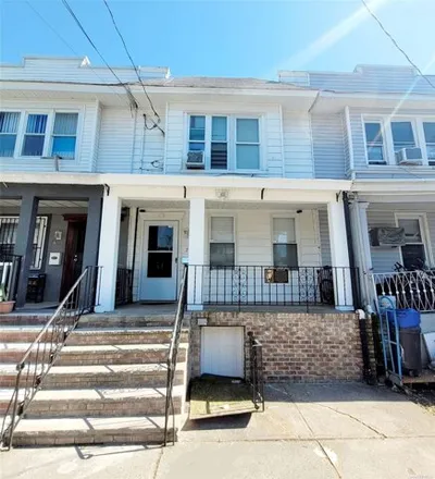 Buy this 3 bed house on 78-14 87th Road in New York, NY 11421