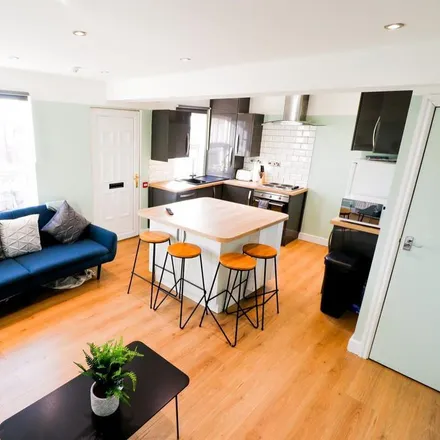 Rent this 4 bed townhouse on Pizza Merano in 173 Woodhouse Street, Leeds