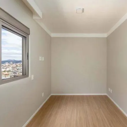 Rent this 3 bed apartment on Rua Orlando Odílio Koerich in Jardim Atlântico, Florianópolis - SC