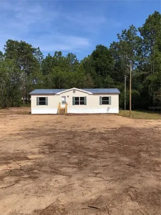Buy this studio apartment on 11872 Northeast 100 Avenue in Levy County, FL 32618