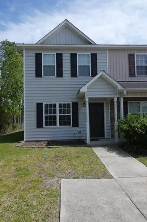 Rent this 2 bed townhouse on 1098 Ornate Drive in Lakewood, Jacksonville