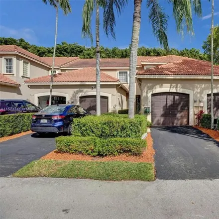 Buy this 2 bed townhouse on 912 Sevilla Circle in Weston, FL 33326