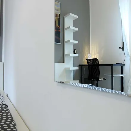 Rent this 4 bed room on Via Antonio Panizzi in 20146 Milan MI, Italy