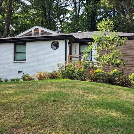 Rent this 3 bed house on 1747 Stokes Avenue Southwest in Atlanta, GA 30310