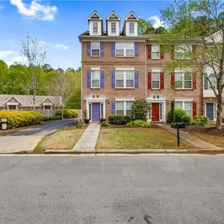 Rent this 3 bed townhouse on Chastain Gardens Northwest Drive in Cobb County, GA 30144