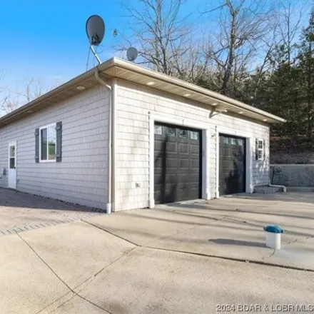 Buy this 3 bed house on 370 Lake Rd 5-88 G in Camden County, MO 65020