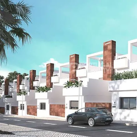 Buy this 3 bed townhouse on Algarve in Largo 25 de Abril, 8700-085 Moncarapacho